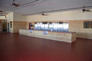 Cafeteria with red floor by Kucel Contractors