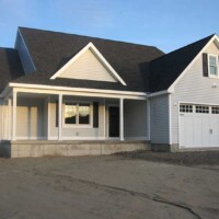 White home by Kucel Contractors in Gloversville, NY